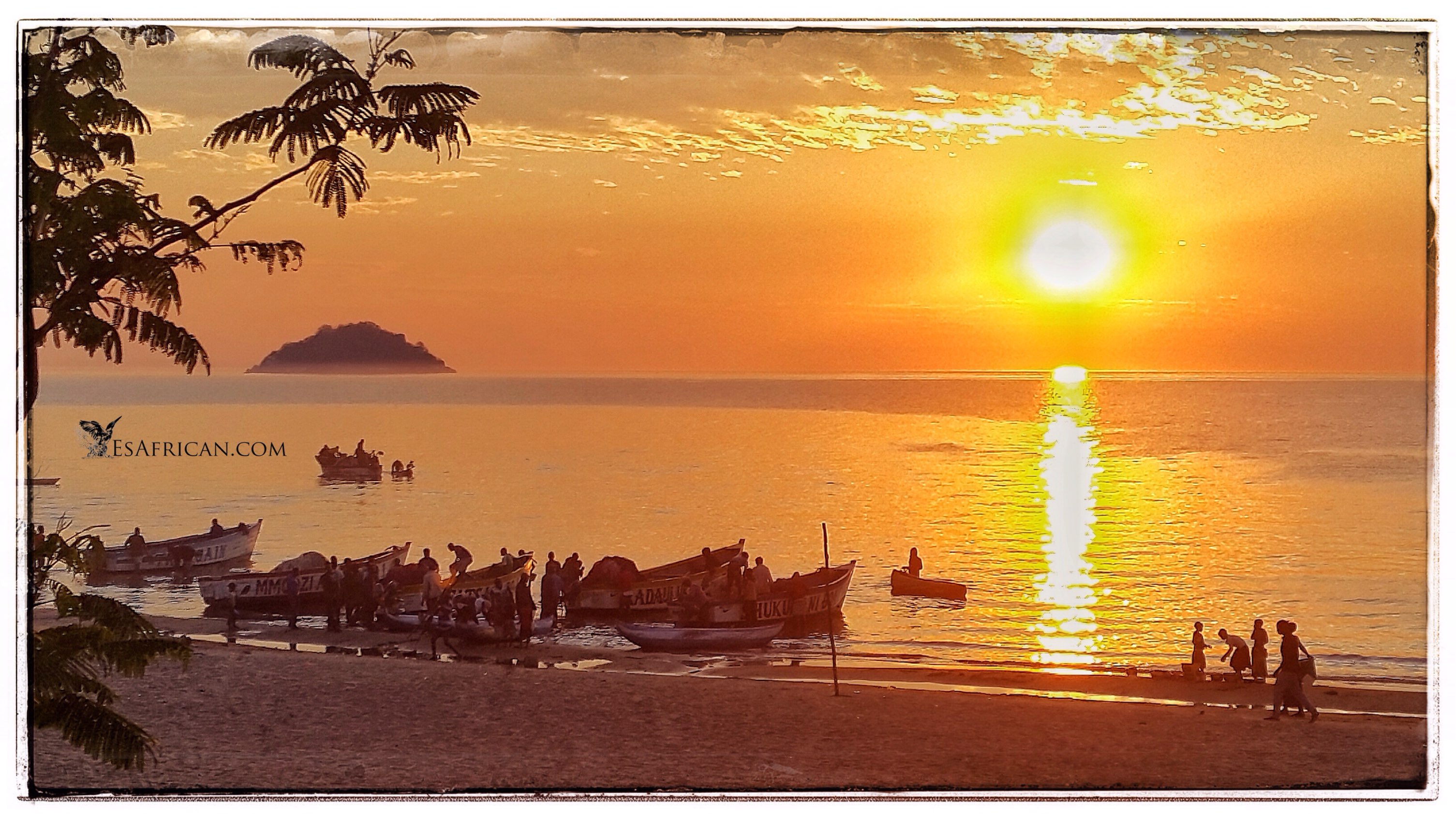 A Senga Bay sunrise. Fishing boats were returning and someone's airport transfer for a flight that day...well...