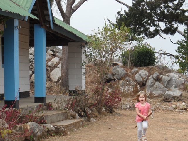 Ruth plays outside the front of Frances Cottage