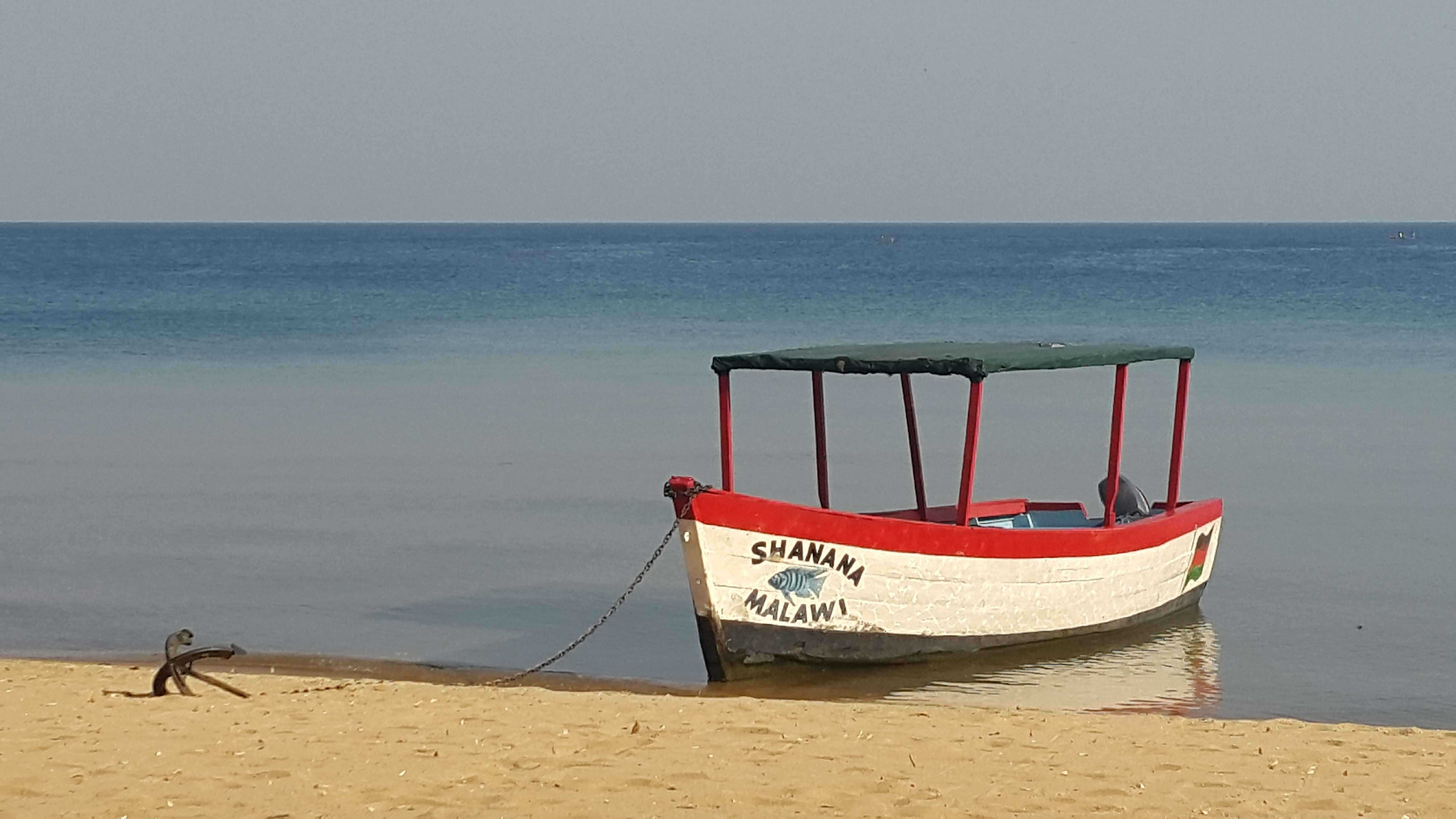 Learn riddles and practice Chichewa at the beach on the shores of Lake Malawi? Picture from the bar at Fat Monkeys lodge, Cape Maclear.