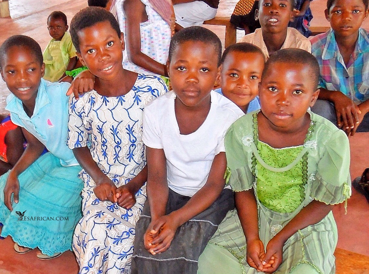 You will be welcomed with smiles and informality in Malawi, even if you are not an expert on cultural nuances. Children at church near Mulanje.